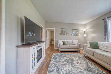 Living area with beautiful LVP flooring, also in m