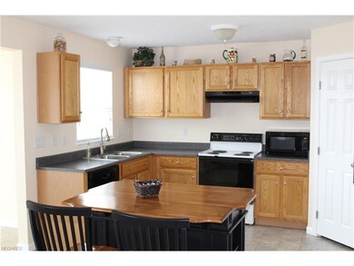 Kichen with island.   Really nice pantry!
