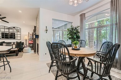 Dining room with recessed lighting and a ceiling f