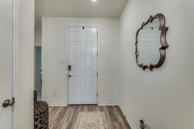 Entryway featuring hardwood / wood-style flooring