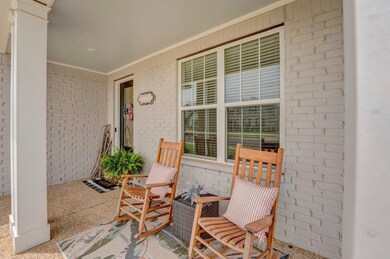 View of patio featuring covered porch