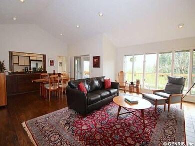 Great Room The open floor plan and soaring ceiling