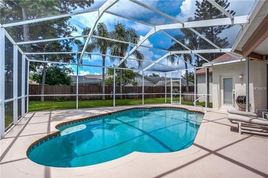 View of pool and backyard