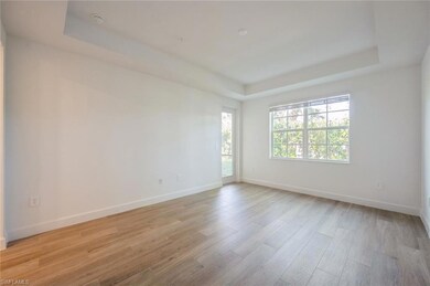 Empty room featuring a wealth of natural light, li