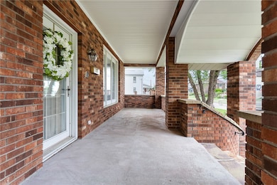 Spacious 40x23 covered front porch with multiple s