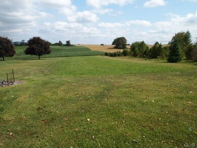 VIEW FROM BACK CORNER OF LOT ON CLEARED SIDE