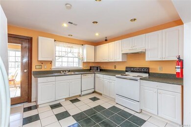 Kitchen with recess lighting.
