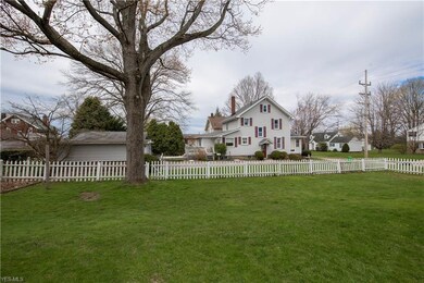 Nice sized yard with the white picket fence!