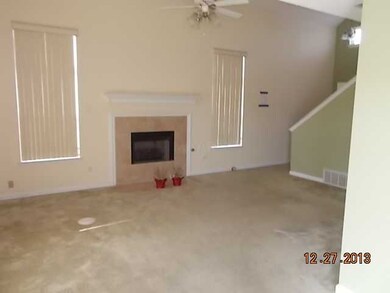 TWO STORY ENTRY TO THE RIGHT WITH STAIRS TO 2ND LE