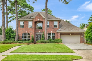 An extravagant walkway leads to the front entrance
