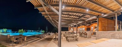 Community pool with a patio area