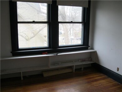 Dining Room Dining in open apartment with hardwood