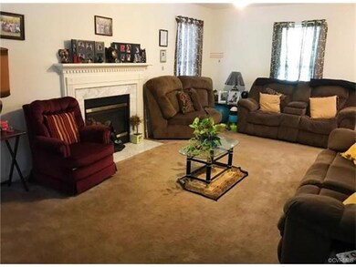Oversized Great Room with Fireplace Open to Breakfast Nook & Kitchen.