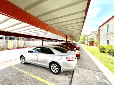 Covered parking lot with fence