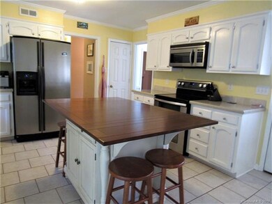 Corian counter tops, stainless steel appliances, p