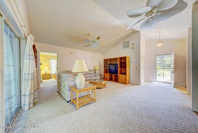 living room with vaulted ceiling