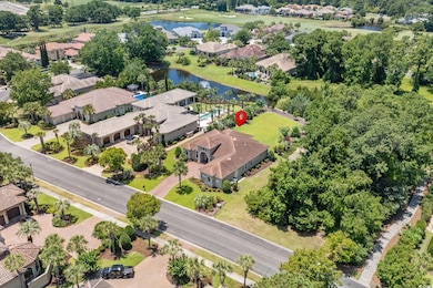 Aerial perspective of suburban area with a large body of water