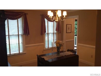 New paint and carpet in dining room.