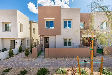 Multi unit property featuring stucco siding, a gat