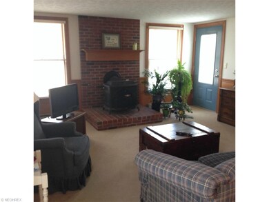 First Floor Great Room has wood burning Stove, lot