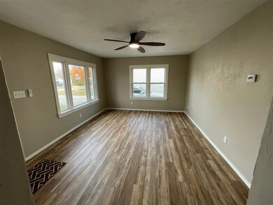 Spare room featuring hardwood / wood-style floors 