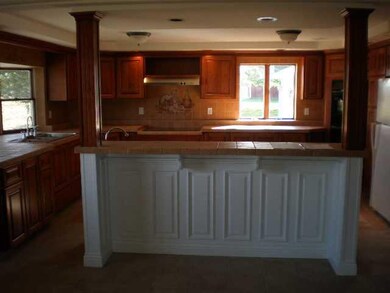 Dining Room. and is separated from the kitchen by 