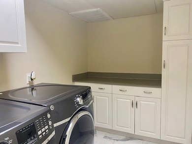 Lots of storage in utility room.
