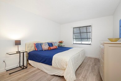 Bedroom featuring light wood-type flooring