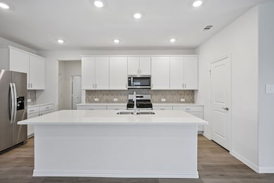 Photo is not of the actual home, but is an inspirational photo of builder’s model home and may depict options, furnishings, and/or decorator features that are not included.