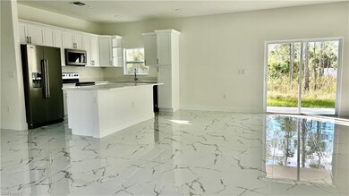 4341 64th Ave NE, Rural Estates, FL 34120 - photo 6