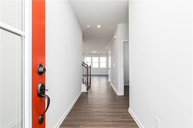 Inviting entryway with high-ceilings and natural l