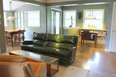 Cozy view of the front entry, office nook, living