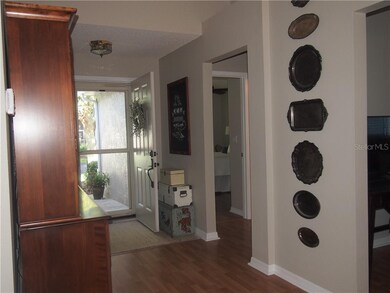 Foyer as enter home with laminate flooring through