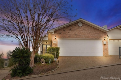 View of front of home featuring a garage