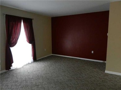 Living Room. LIVING ROOM FEATURES HARDWOOD UNDER WALL TO WALL CARPET AND CHARMING POTTERY BARN COLORS