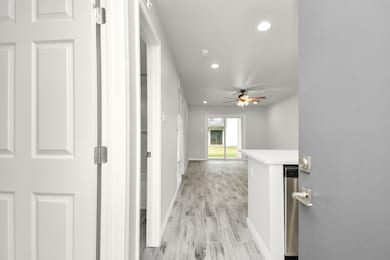 As you enter the apartment, to the right is the Ki