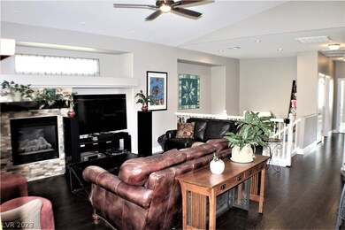 2ND LEVEL FAMILY ROOM ACCENTED WITH COZY FIREPLACE