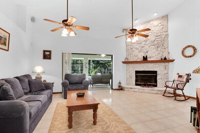 living room with triple sliders