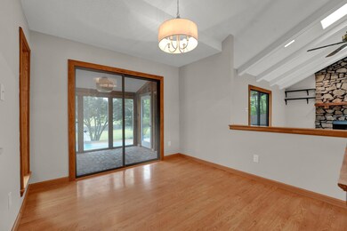 Spare room with ceiling fan, light hardwood / wood