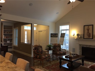 Entry and a bonus space for an office or den.