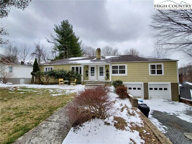 Nice front yard space, plenty of parking and a 2 c