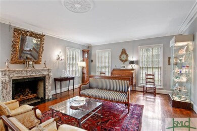 LIVING ROOM: Warm, light-filled Living Room with v