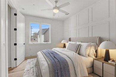 Bedroom featuring light wood-style floors, basebo