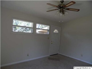 'spacious Living Room with Ceiling Fan