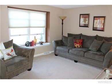 Living Room CUSTOM BLINDS AT LARGE PICTURE WINDOW