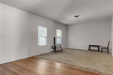 Empty room featuring carpet floors