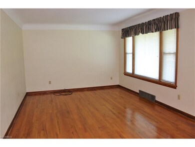 Spacious Living room with picture window and hardw