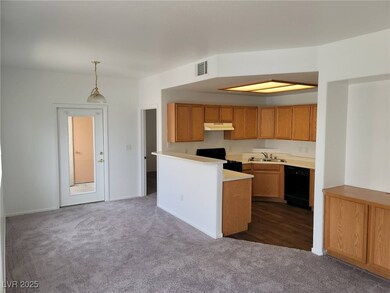 Kitchen featuring a center island, dishwasher, dec