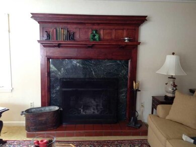 Other. A close up of the antique mantle in the liv