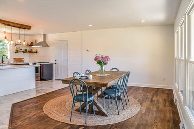 Gorgeous hardwood flooring in the dining room, ope